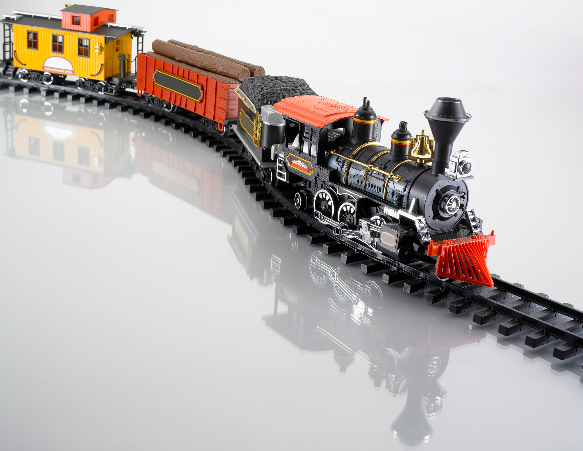 Colorful toy train on a winding track, symbolizing personal transformation and emotional exploration.