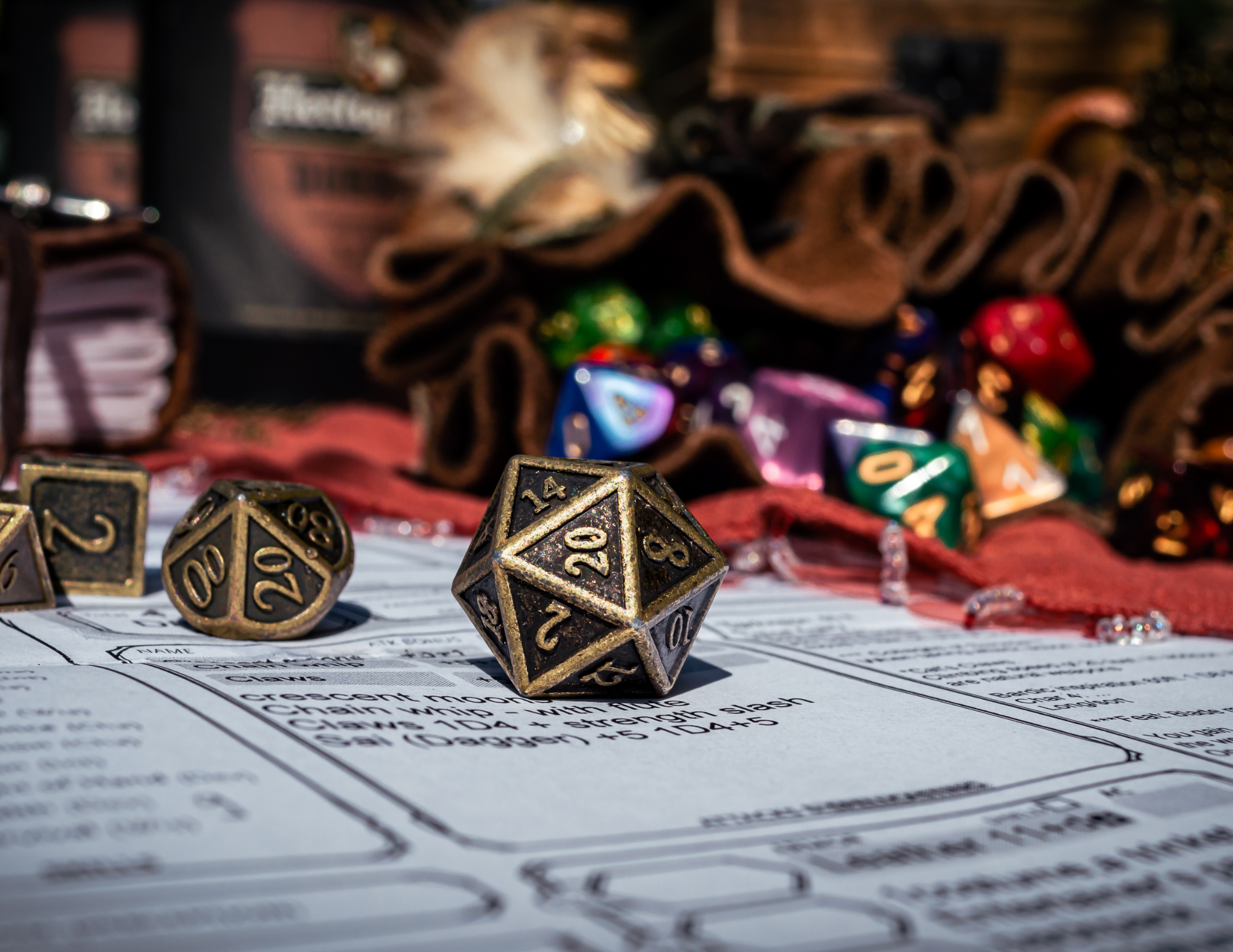 A Dungeons & Dragons character sheet with metal polyhedral dice and colorful accessories, representing a fantasy-themed therapy approach.