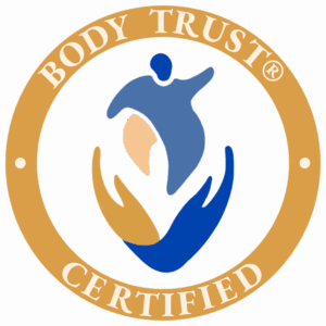 Circular gold seal with the words “Body Trust® Certified” around a stylized abstract figure and hands in shades of blue and tan — Jenna Stone is a certified Body Trust Provider at Side Quest Psychotherapy