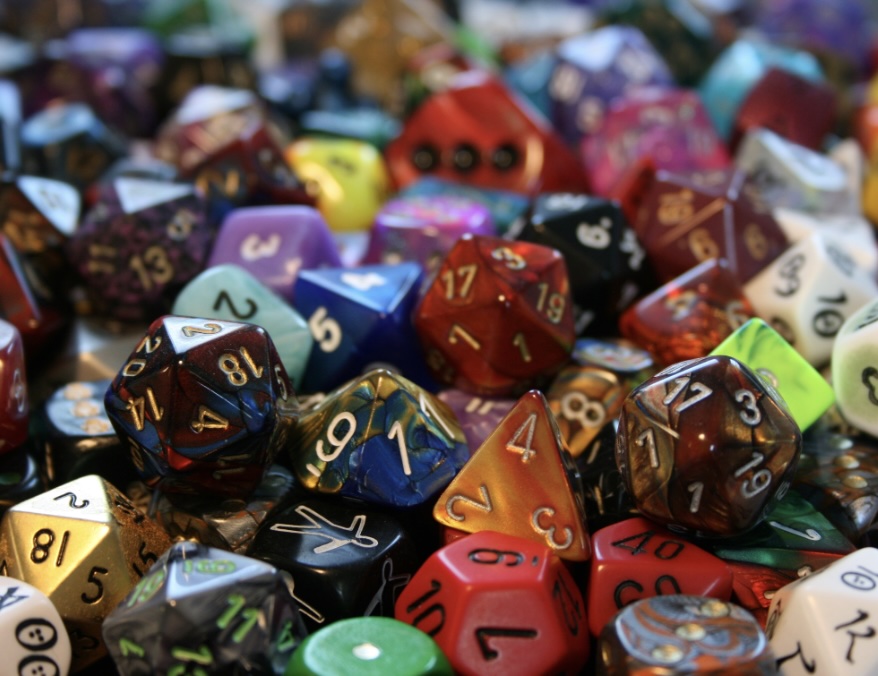 Colorful polyhedral dice used to represent neurodivergent-affirming mental health care at Side Quest Psychotherapy in College Park, Maryland